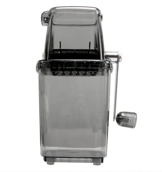 Clear pasta maker with a black interior on a white background