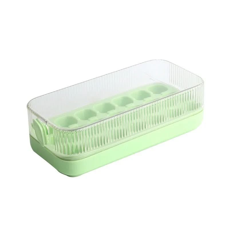 A light green plastic ice cube tray with a clear ribbed lid, shown on a plain white background.