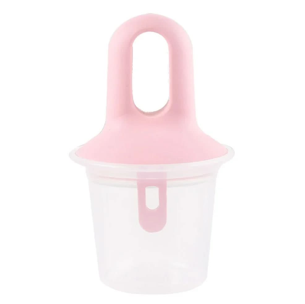 A pink silicone ice pop mold with a clear plastic container base, shown on a solid white background.