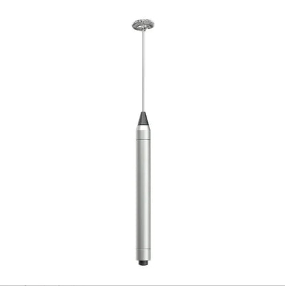 A sleek, modern milk frother with a metallic silver body and black accents, shown vertically against a plain white background.