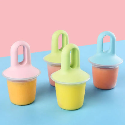 Set of colorful silicone Popsicles containers on a blue and pink background