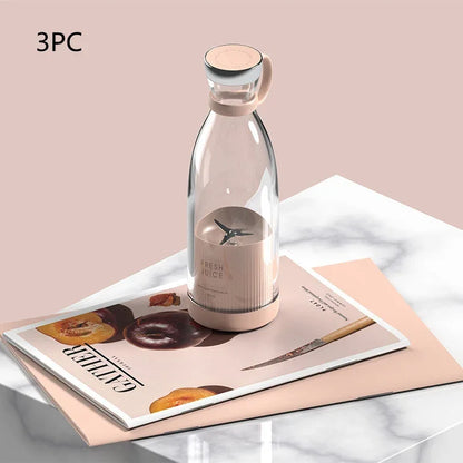 Clear glass bottle with pink base and cap on a magazine with a pink background