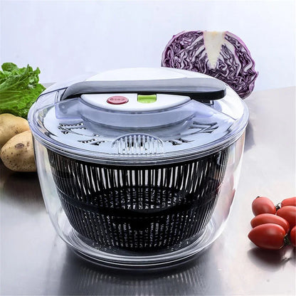Vegetable spinner with vegetables on a white background