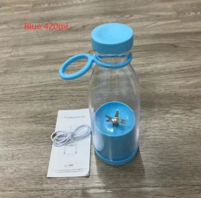 Blue water bottle with a detachable blender attachment on a wooden surface