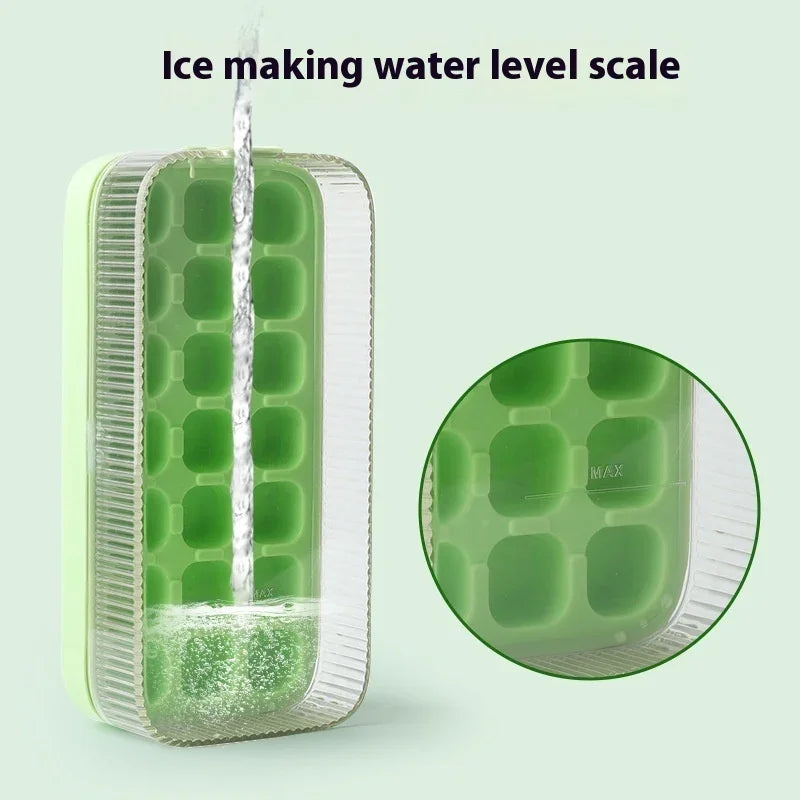 A translucent green ice cube tray with a clear outer rim, shown with water being poured into one cavity. A circular inset close-up highlights the level markings and cell shape.